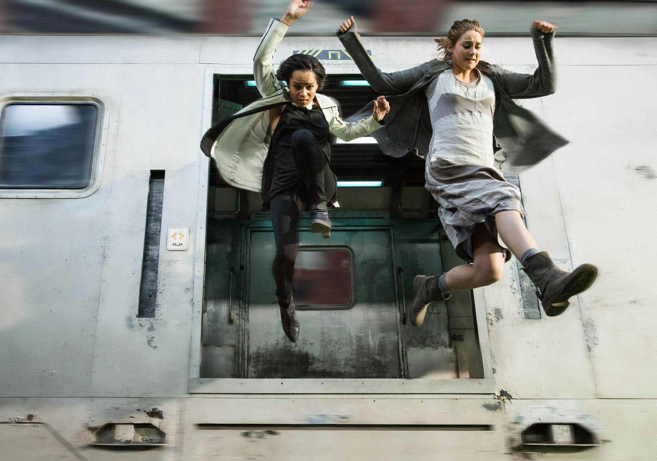 This photo released by Summit Entertainment, LLC shows Zoe Kravitz, left, as Christina and Shailene Woodley as Beatrice "Tris" Prior, in the film, "Divergent." The movie releases Friday, March 21, 2014. (AP Photo/Summit Entertainment, Jaap Buitendijk)
