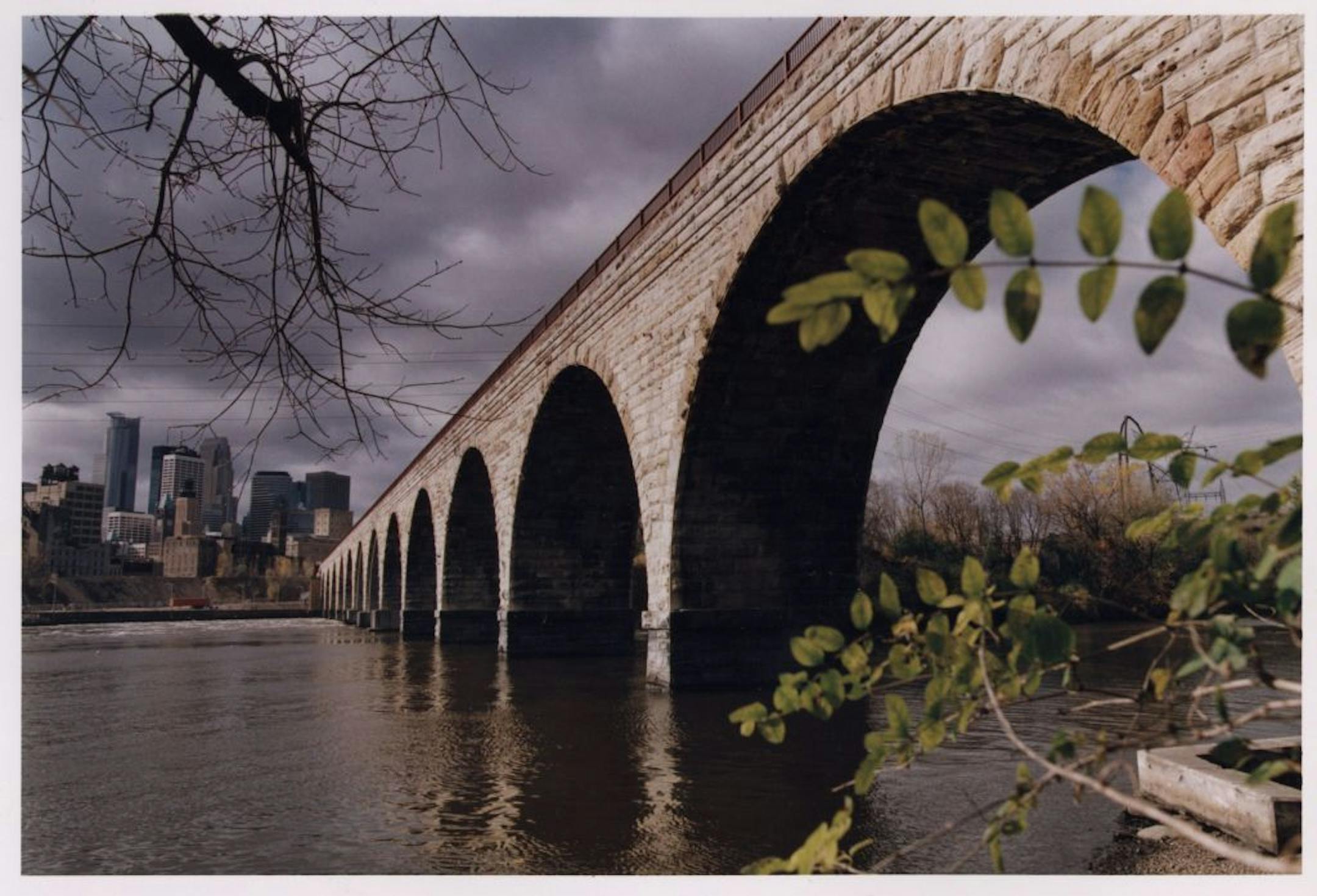 Stone Arch Bridge over the Mississippi River facing downtown Minneapolis