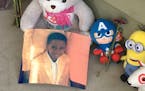 A memorial grew on the porch of the townhome where 7-year-old Keyaris Samuels accidentally shot himself with a loaded handgun discovered in the home.