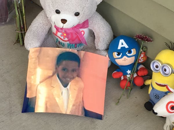 A memorial grew on the porch of the townhome where 7-year-old Keyaris Samuels accidentally shot himself with a loaded handgun discovered in the home.