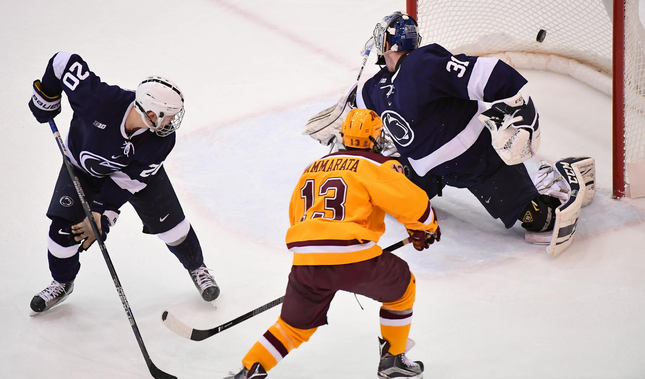 Gophers left wing Taylor Cammarata (13) scored a goal against Penn State Nittany Lions goalie Peyton Jones (31) in the second period Saturday.