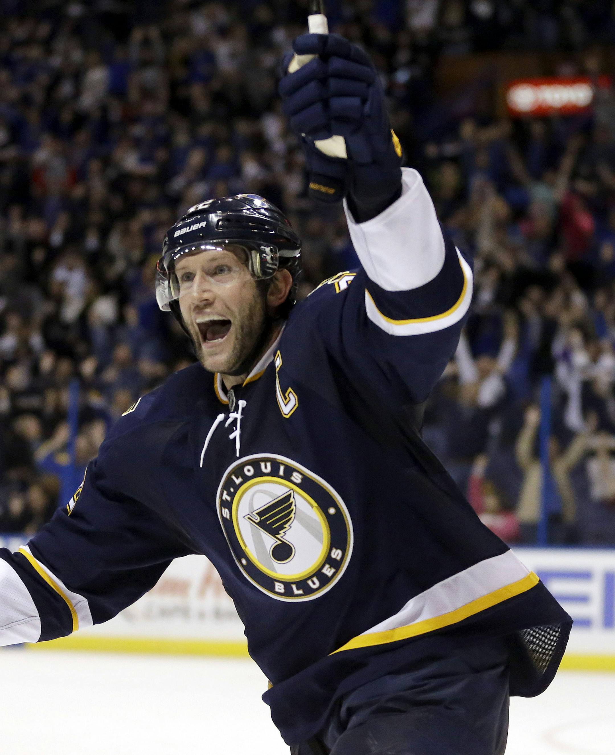 St. Louis Blues' David Backes celebrates after scoring the winning goal in overtime of an NHL hockey game against the Minnesota Wild, Saturday, Oct. 31, 2015, in St. Louis. The Blues won 3-2 in overtime. (AP Photo/Jeff Roberson)