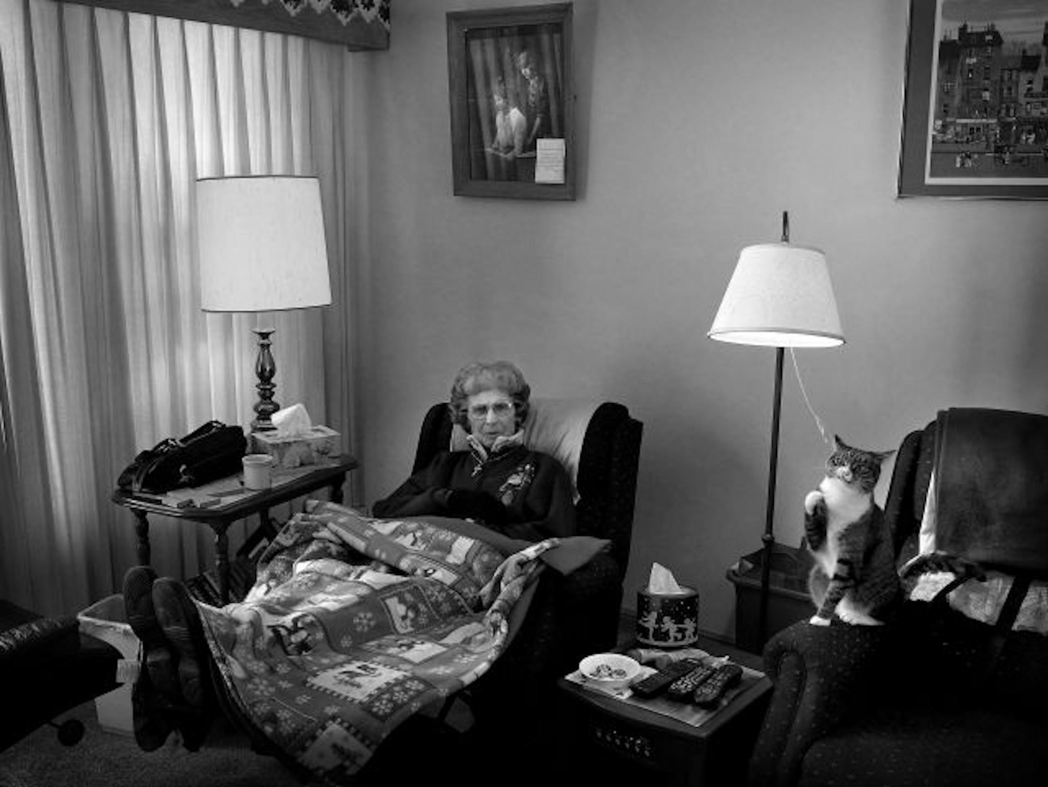 Seated under a photo of her mother and aunt as teenagers, Ruby often struggles to understand her shrinking world, and George the Cat is her ally. "Georgie Porgie and Ruby Doobie, that's us," she said. "Cats are just like people, only they don't talk as much."