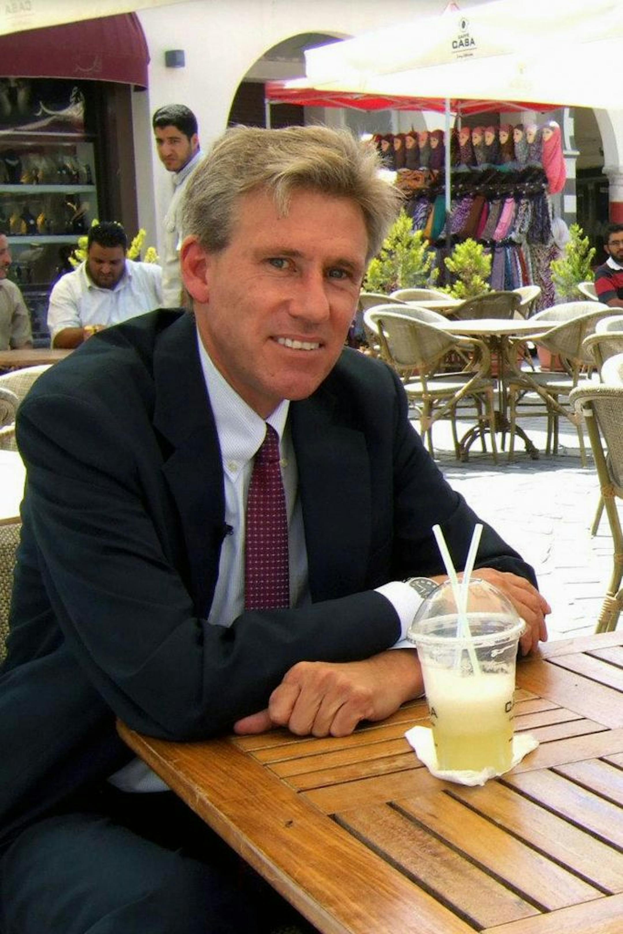In this July 4, 2012, file photograph, U.S Ambassador to Libya Chris Stevens is seen during an interview with a team of Libya Hurra TV. Stevens was killed in an attack on U.S. consulate in Benghazi, Libya, on September 11, 2012.