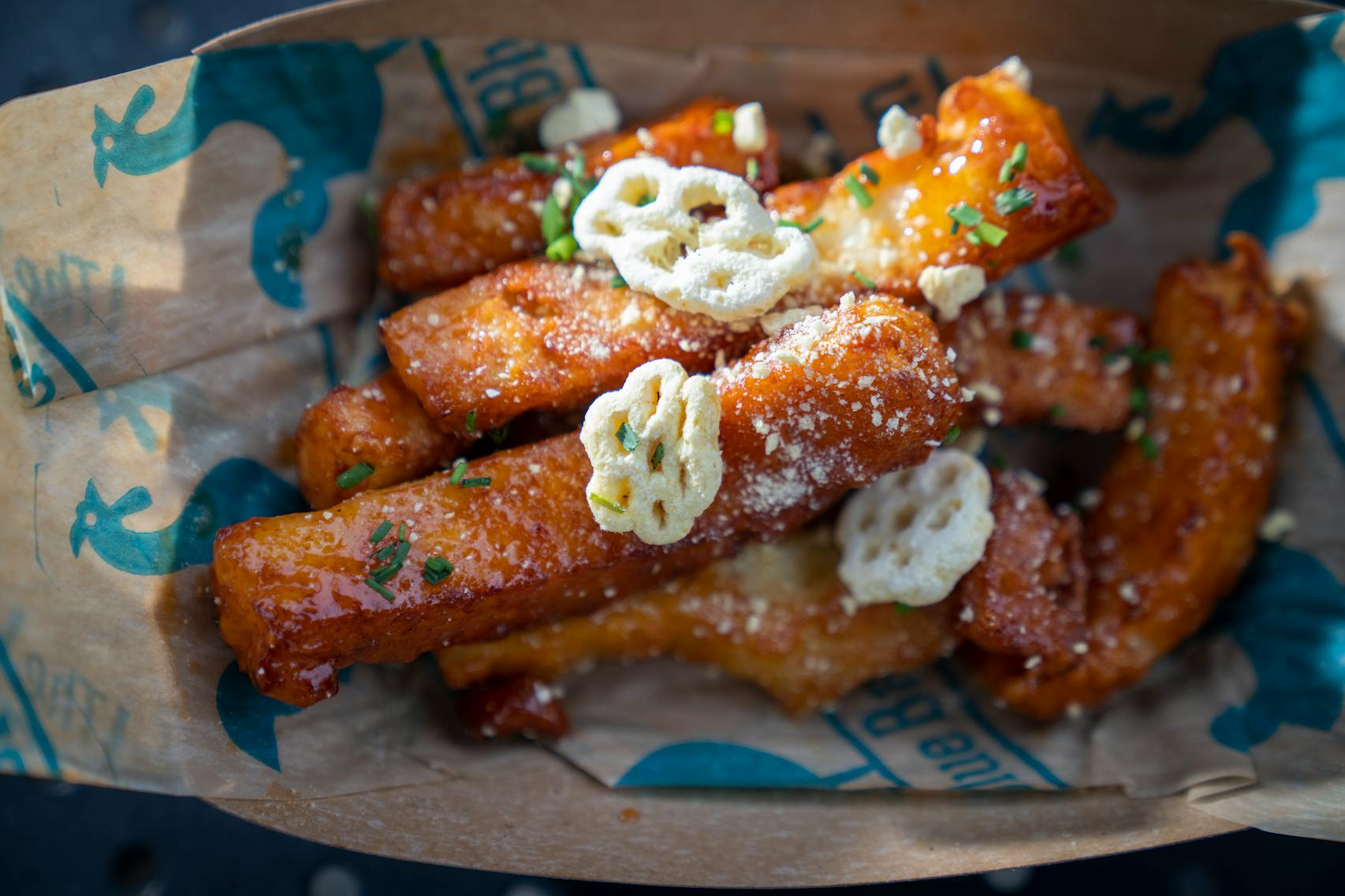 Hot Honey Cheese Sticks from Blue Barn. The new foods of the 2023 Minnesota State Fair photographed on the first day of the fair in Falcon Heights, Minn. on Tuesday, Aug. 8, 2023. ] LEILA NAVIDI • leila.navidi@startribune.com