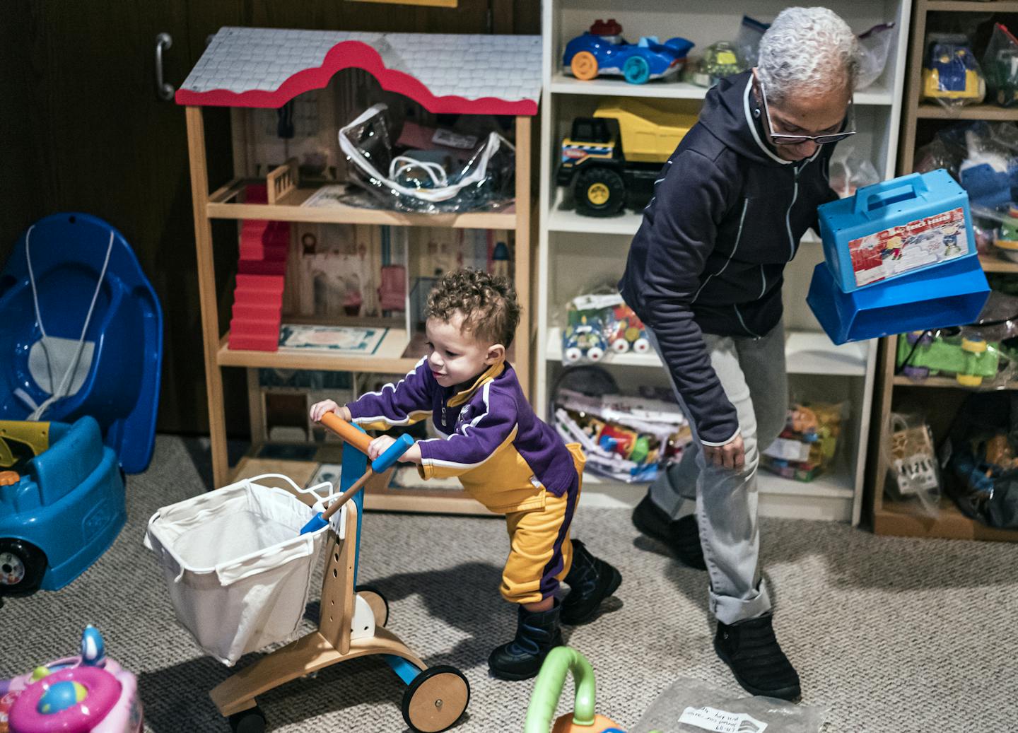 Ceola McClure-Lazo helped her grandson Vail check out some toys he might take home. ] The Minneapolis Toy Library is open three times a week every OTHER week...Families of children ages 0 to 5 can check out up to five toys for 2-4 weeks. Toys can also be recycled at the library which will likely be bustling on this particular Monday. RICHARD TSONG-TAATARII &#xa5; richard.tsong-taatarii@startribune.com