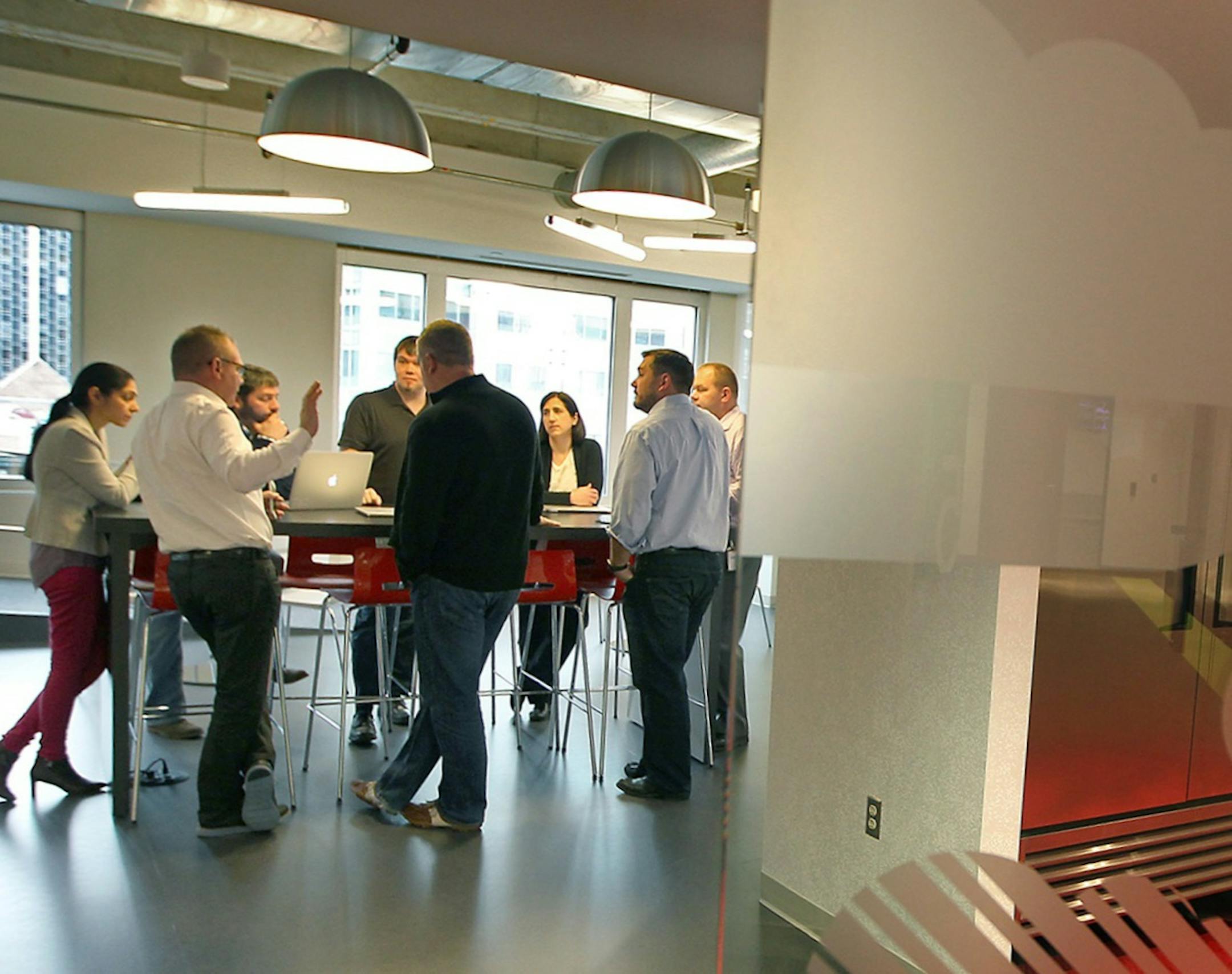 SPS Commerce employees met for a meeting in "the Cloud" room, Tuesday, May 19, 2015 in downtown Minneapolis, MN. ] (ELIZABETH FLORES/STAR TRIBUNE) ELIZABETH FLORES • eflores@startribune.com ORG XMIT: MIN1505191100380698