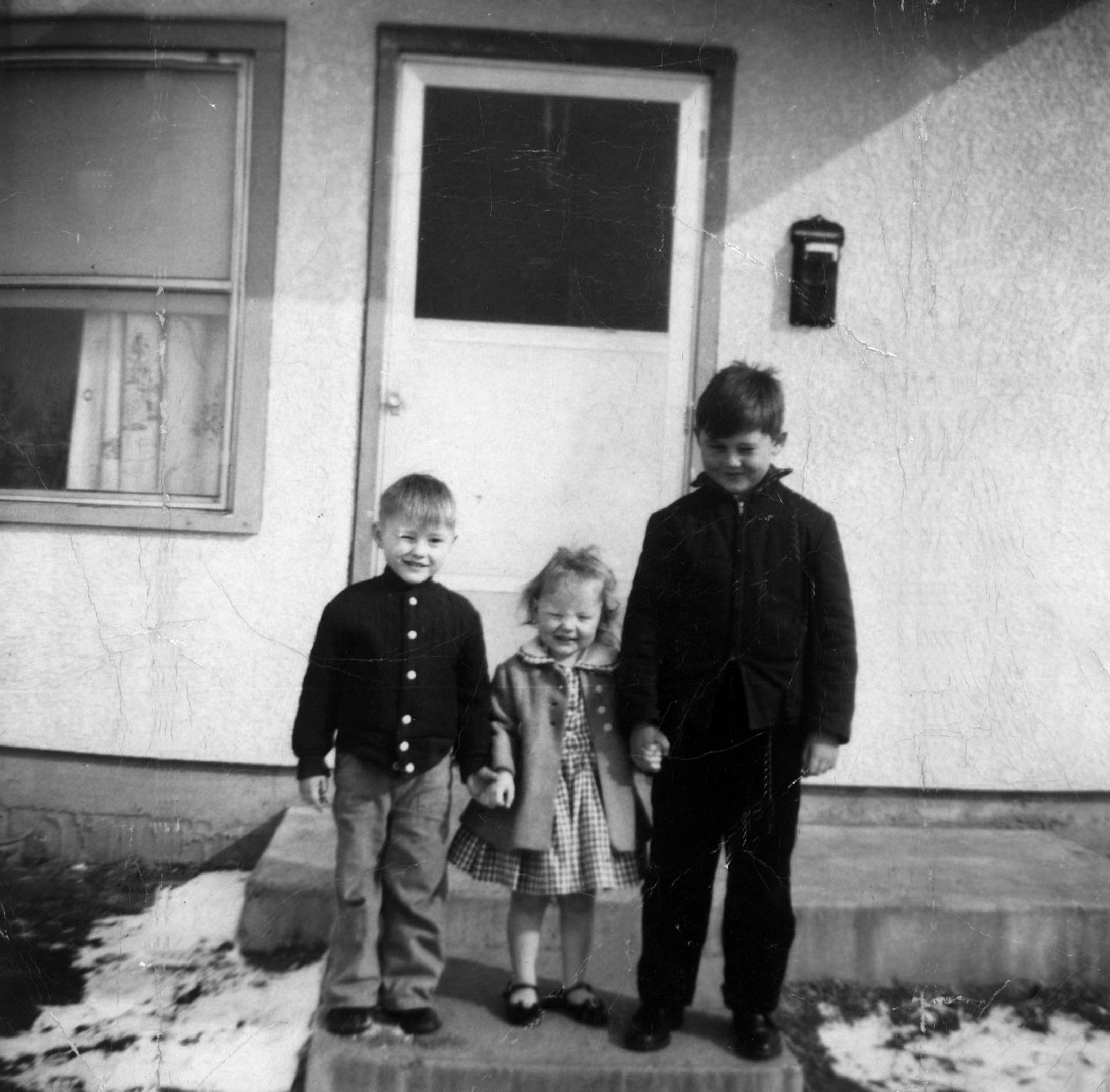 A young Louie Anderson posed with his younger brother and a family friend at the low-income housing project where he grew up. Today at age 44 the comedian entertains at Bally's casino near his new home in Las Vegas.