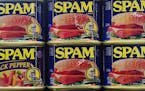 Hundreds of assorted-flavor cans of Spam were on display in "Can Central" near the entrance of the Spam Museum Thursday. ] (AARON LAVINSKY/STAR TRIBUN