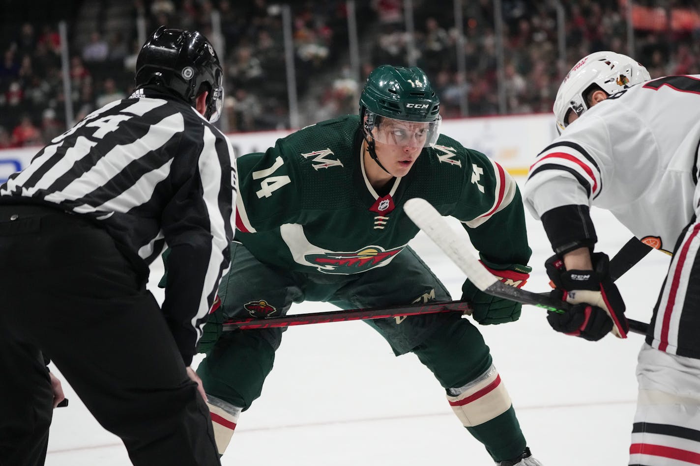 Minnesota Wild center Joel Eriksson Ek (14) during a faceoff in the first period.