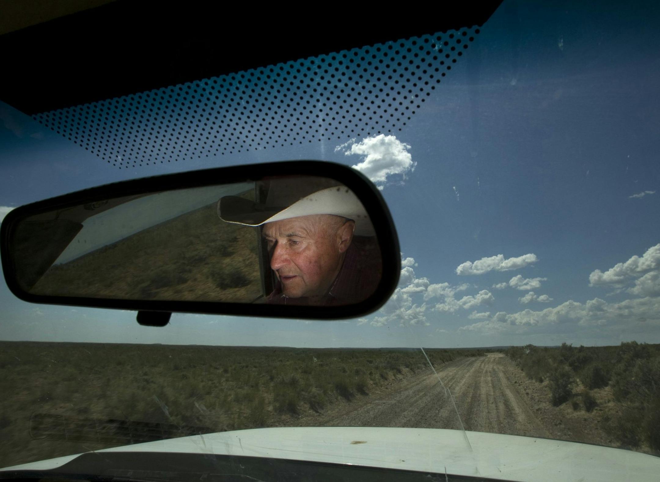 Rancher Ken Wixom drives across land managed by the Bureau of Land Management where his Rambouillet sheep graze near Atomic City, Idaho. Because of drought condition the BLM has cut the amount of grazing available to ranchers. (Allen J. Schaben/Los Angeles Times/MCT)