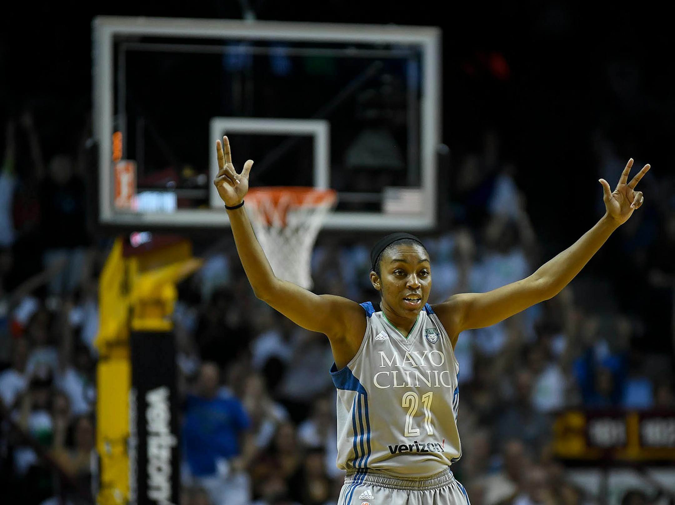 Minnesota Lynx guard Renee Montgomery (21) celebrated after guard Seimone Augustus (33) hit a 3-pointer in the second half against the Los Angeles Sparks.