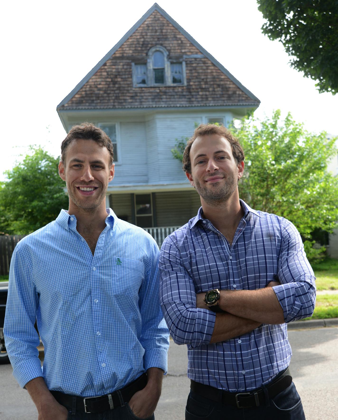 Drew Levin and Danny Perkins stand in front of a house they are working on near the U of M, they started fixing up foreclosures, keeping some for rentals and flipping others. Their antics will be the subject for a new HGTV series that permieires this month. The show was shot entirely in Minneapolis. Each episode will show them evaluating three fixer-uppers, picking one and then doing the renovation. They now have a portfolio of fifty or so rentals. They both were reflected in an oval mirror in a