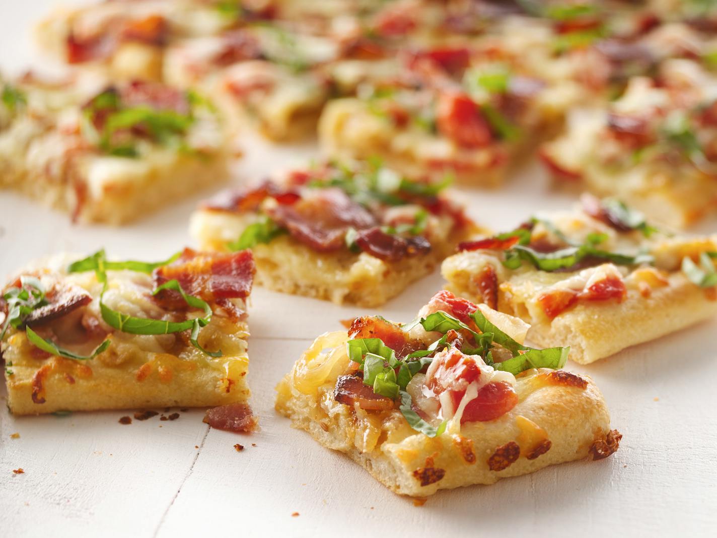 Caramelized Onion and Peppered Bacon Flatbread was a winning Pillsbury Bake-Off recipe. Provided