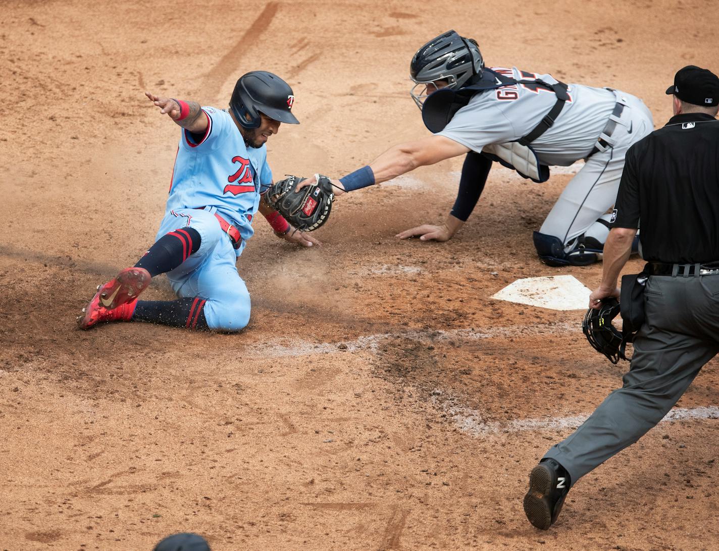 The Twins' Eddie Rosario was tagged out by Tigers catcher Grayson Greiner in the fifth inning Sunday.