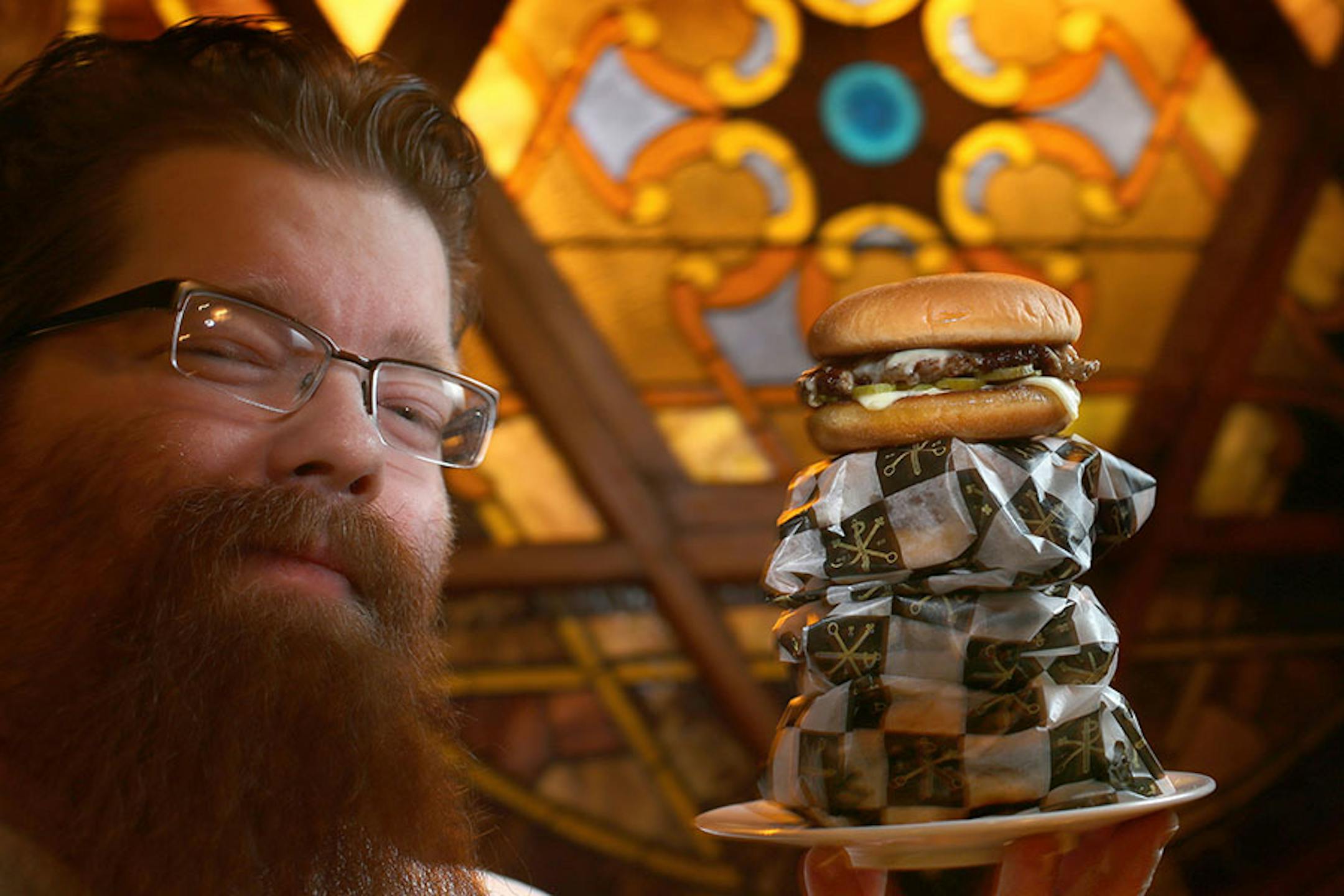 The Michael DeCamp Constantine Cheeseburger is a really simple, and based on the single-patty style cheeseburger. It arrives at the table wrapped in paper and is around 5 bucks. In the photo is Chef Michael DeCamp Extra: 578311 RN012816 ORG XMIT: MIN1601241604010626