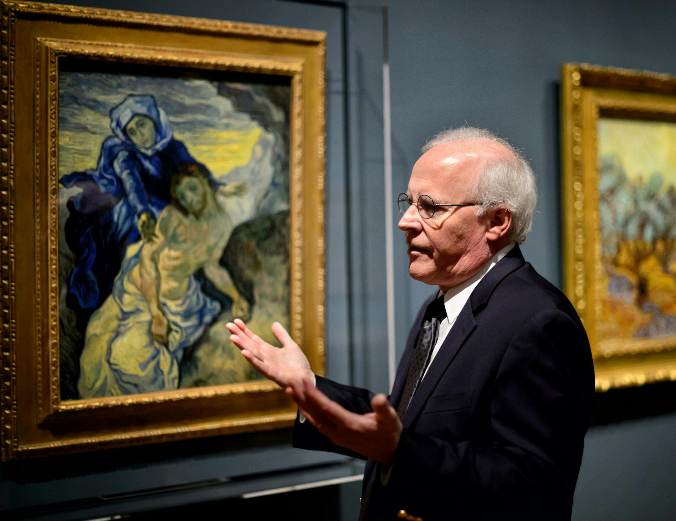 Minneapolis Institute of Art painting curator Patrick Noon with Vincent Van Gogh’s “Pieta,” a work in the exhibit that shows Delacroix’s influence in its composition — but rendered in striking colors that are decidedly Van Gogh’s own.