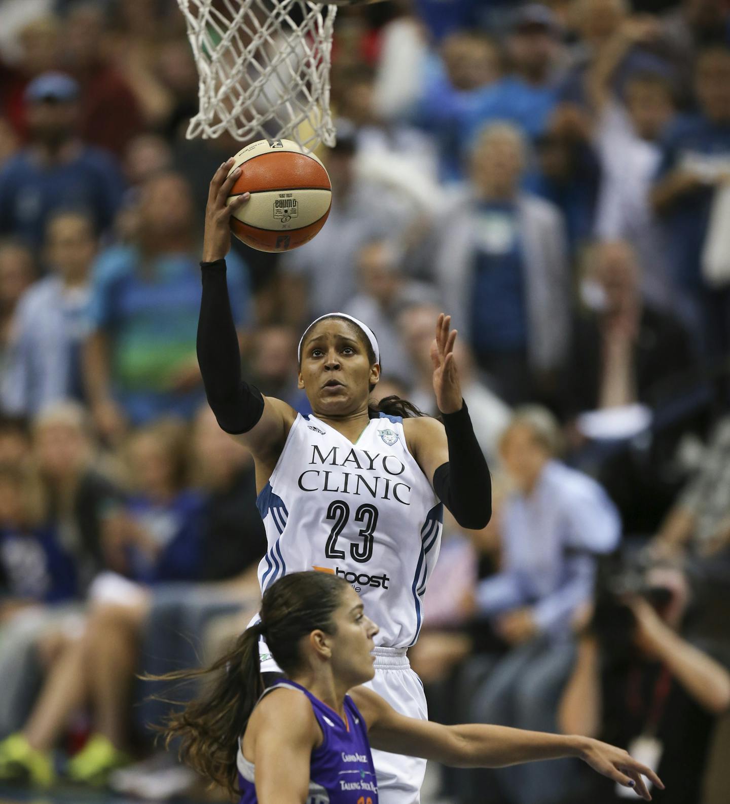 Lynx forward Maya Moore (23) with a late fourth quarter layup over Phoenix Mercury guard Marta Xargay Casademont (10) Thursday night at Target Center. She finished with 19 points. ] JEFF WHEELER &#xef; jeff.wheeler@startribune.com The Minnesota Lynx began their Western Conference Final series with a 67-60 win over the Phoenix Mercury in an WNBA game Thursday night at Target Center in Minneapolis.