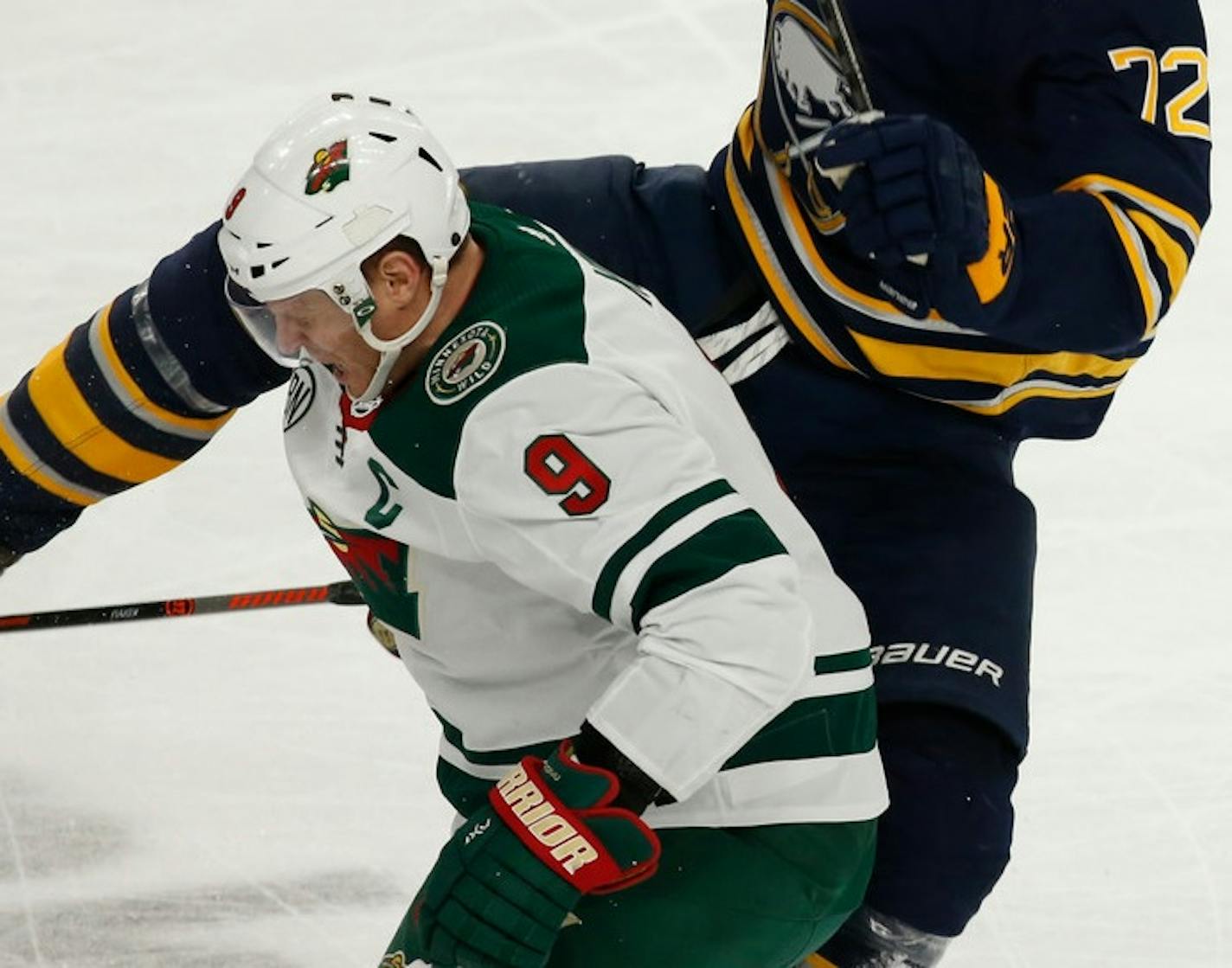 Mikko Koivu grimaces after the hit on which he suffered his season-ending knee injuries.