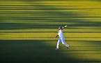 Twins center fielder Gilberto Celestino warms up for the team's spring training game against the Pirates on Feb. 29