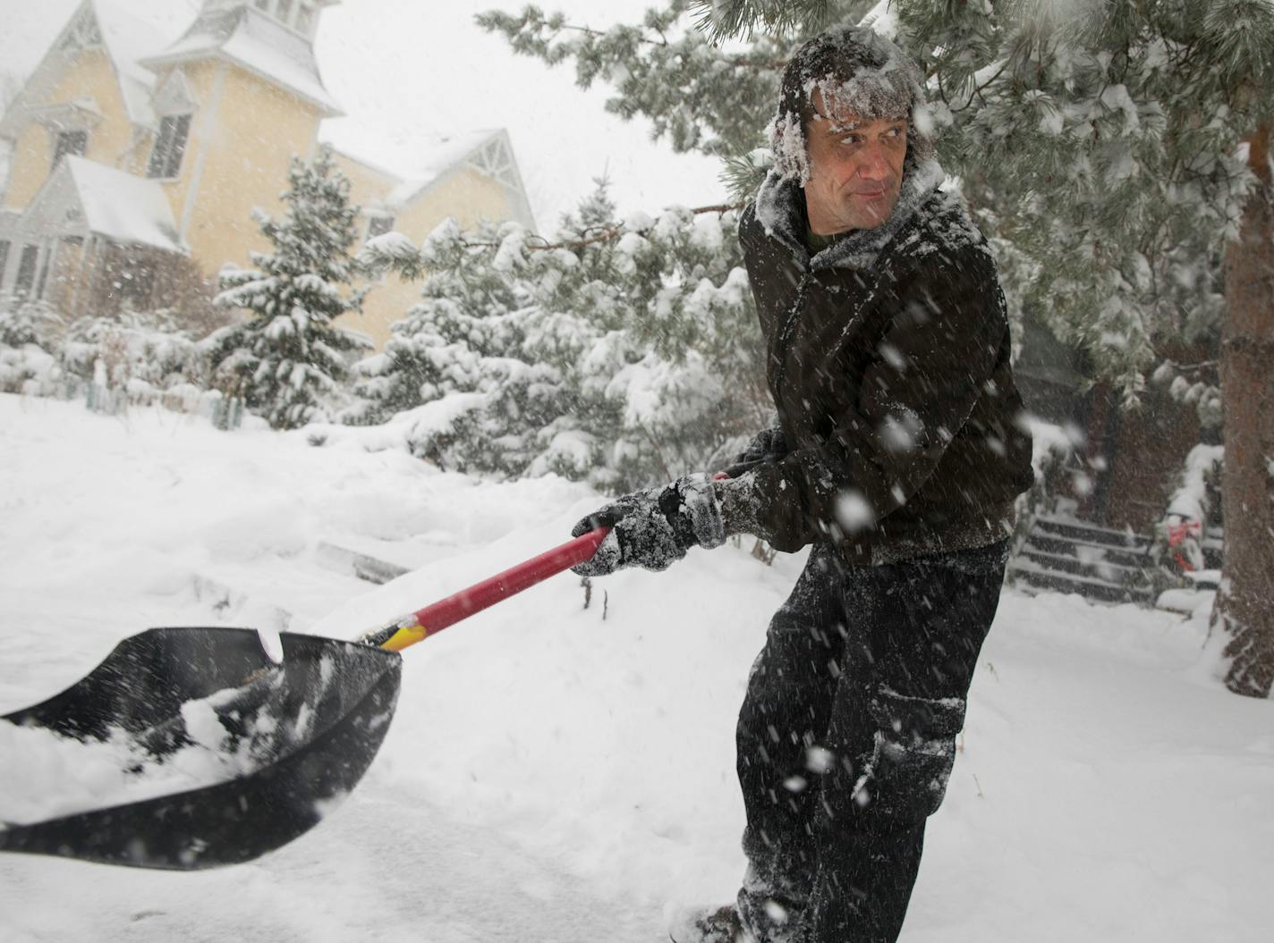 A Minnesota man helped his neighbor shovel a sidewalk in St. Paul during a January storm.