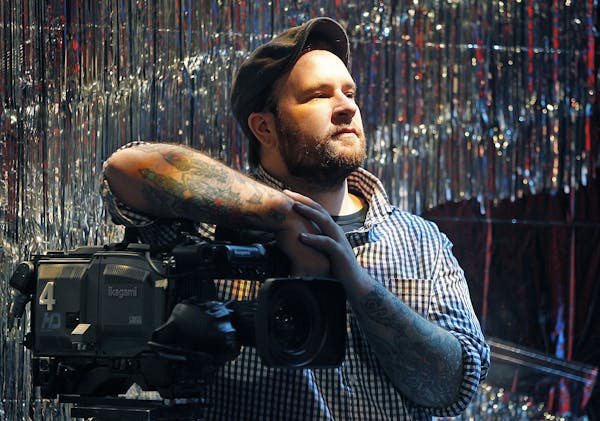 Dan Huiting worked on setting up lights recently at the TPT studios in downtown St. Paul. Huiting has almost singlehandedly made music videos relevant