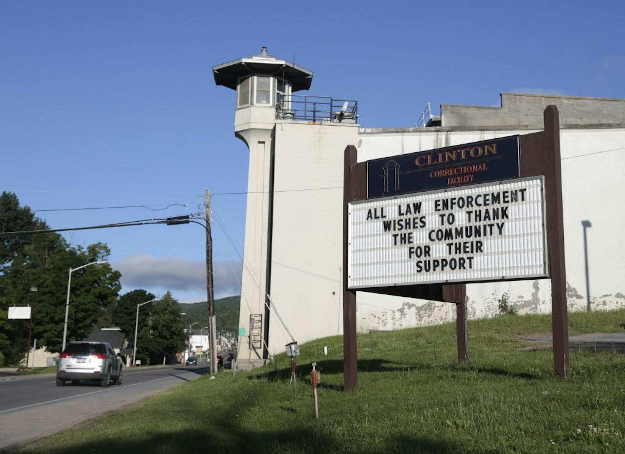 A sign at Clinton Correctional Facility thanks the community as the search for two escaped prisoners from the facility continues, on Wednesday, June 24, 2015, in Dannemora, N.Y. Hundreds of searchers checked ATV trails and logging roads and went door-to-door in far northern New York trying to close in on David Sweat and Richard Matt, who escaped from the maximum-security prison more than two weeks ago.