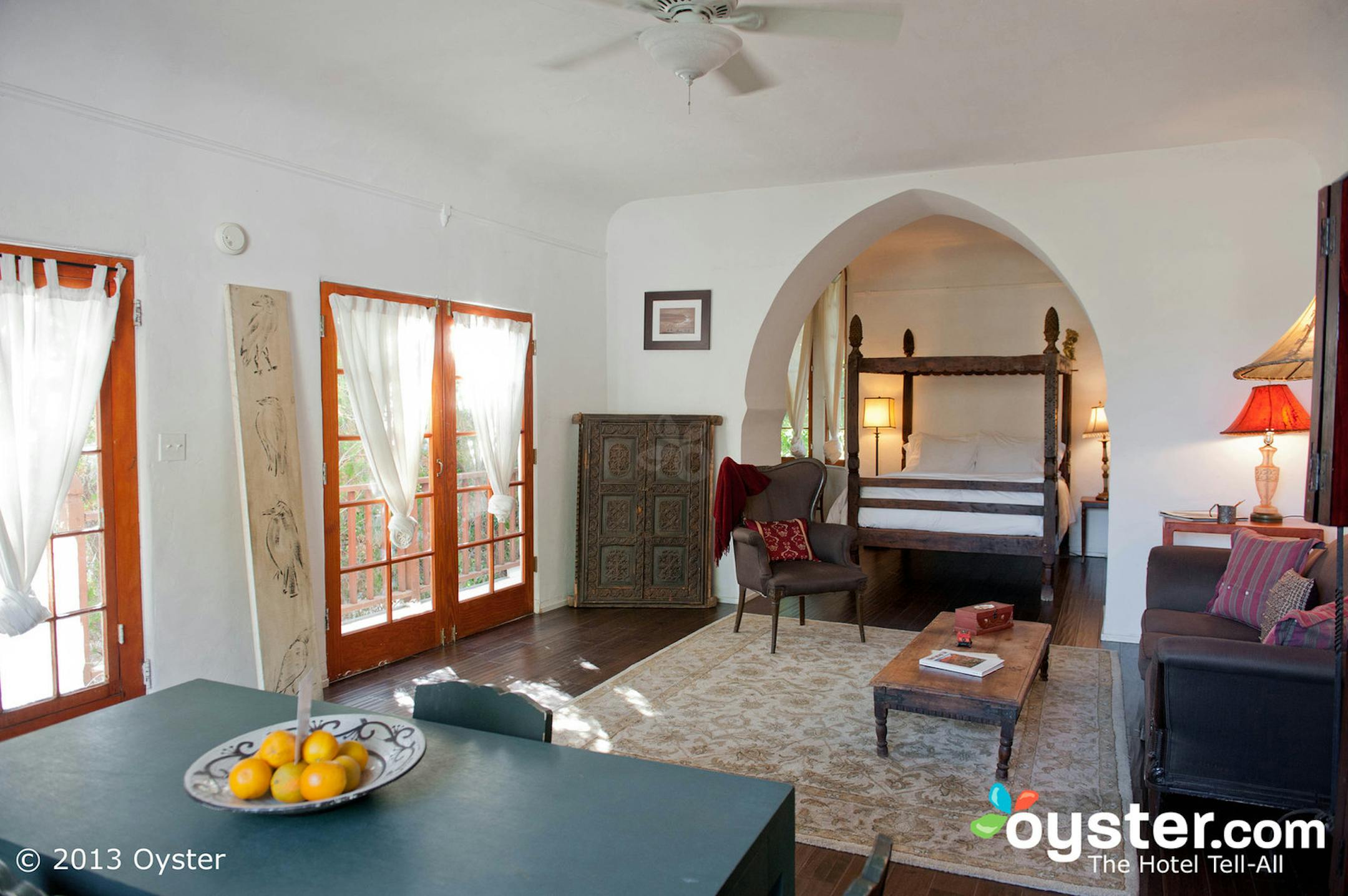 The Artist Studio at Korakia Pensione in Palm Springs, Calif., features an antique four-poster bed and interesting sketches, and light-filled French doors add to the aesthetic. (Oyster.com/MCT) ORG XMIT: 1135301