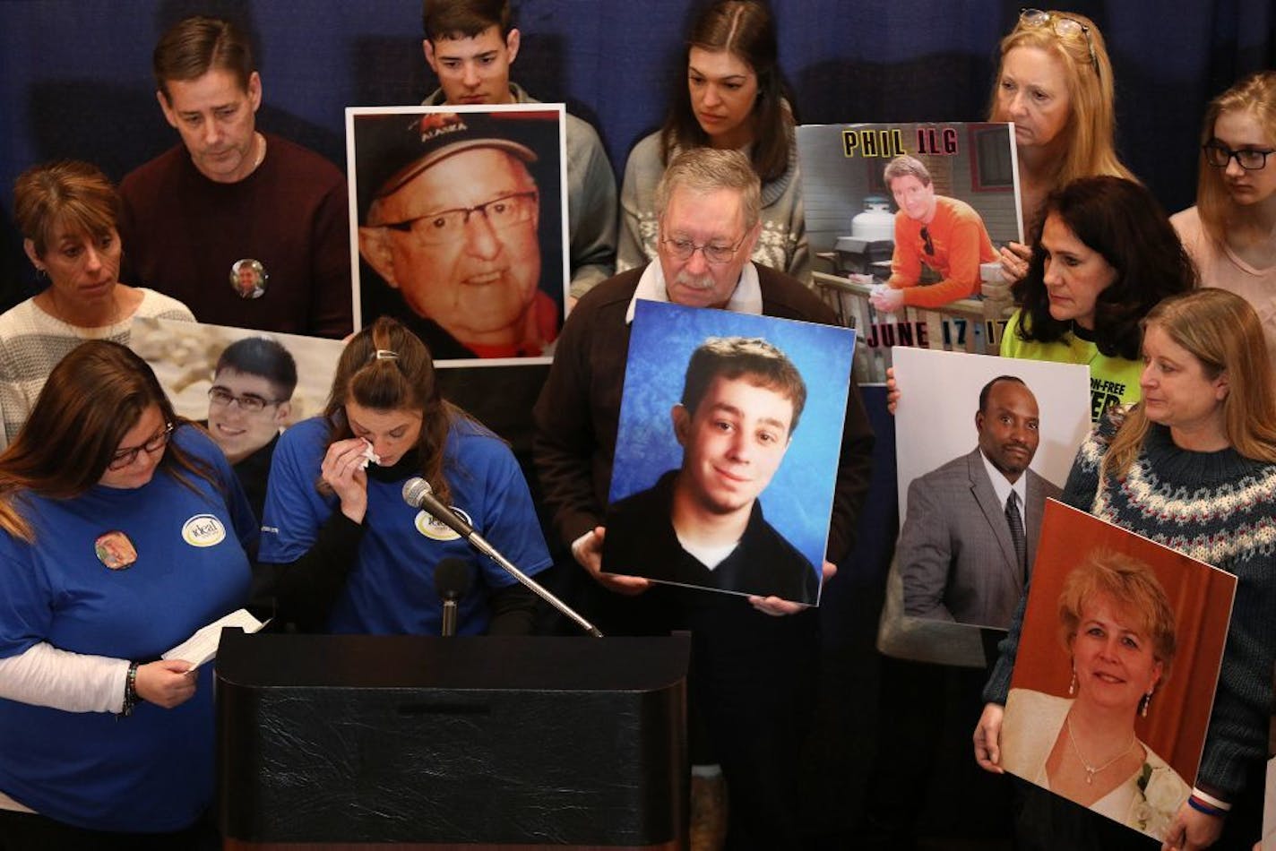 Families of those killed by distracted drivers listened during a rally Thursday in the State Capitol rotunda to drum up support for a law that would ban the use of hand held cellphones and electronics by drivers.