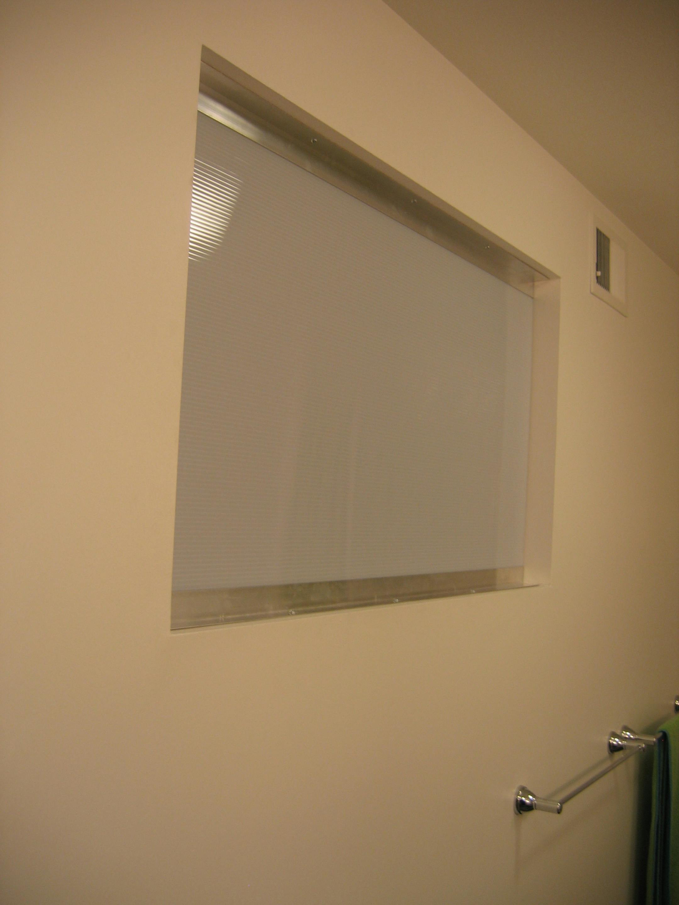 The polycarbonate window finished the room and worked to allow natural daylight in.