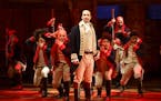 Lin-Manuel Miranda, foreground, with the cast during a performance of "Hamilton," in New York.