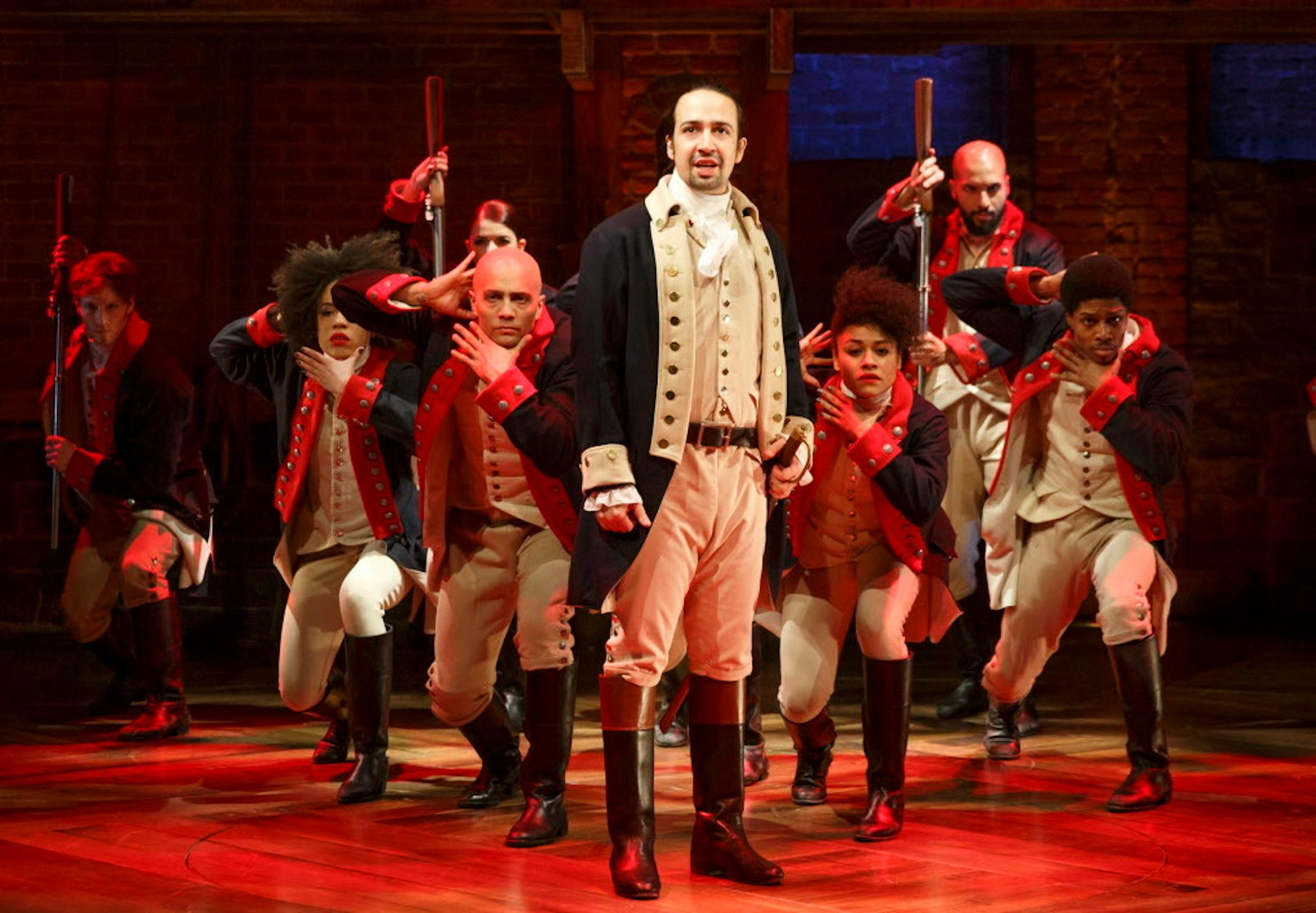 Lin-Manuel Miranda, foreground, with the cast during a performance of "Hamilton," in New York.