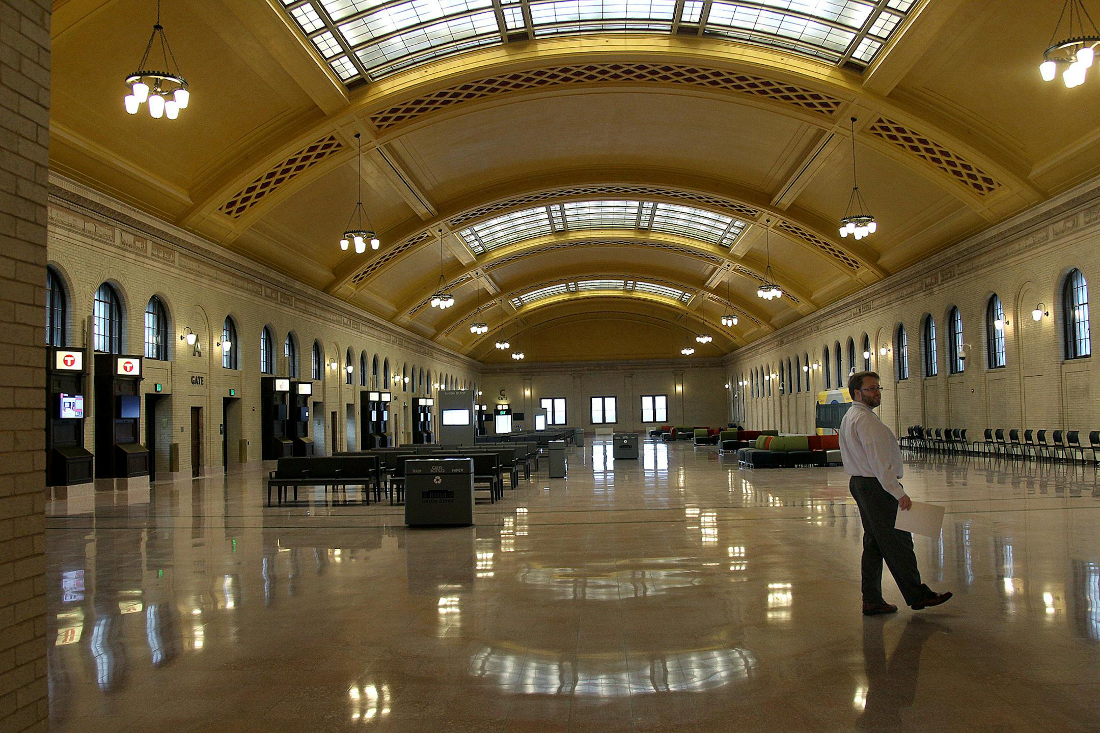 Josh Collins gave a tour of the new Union Depot, Monday, December 3, 2012 in St. Paul, MN.  After more than 40 years without sending or receiving trains and buses, the newly renovated Union Depot reopens Dec. 8 and inaugurates a new era in St. Paul transit. Metro buses will begin using the depot immediately, followed next year by regional buses and Amtrak, and after that by light-rail transit just outside.(ELIZABETH FLORES/STAR TRIBUNE) ELIZABETH FLORES ' eflores@startribune.com
