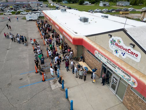 People line up to purchase recreational cannabis Tuesday, Aug. 1, 2023 outside NativeCare in Red Lake, Minn.. The Red Lake Nation opened the state's first recreational marijuana dispensary Tuesday morning. ] AARON LAVINSKY • aaron.lavinsky@startribune.com