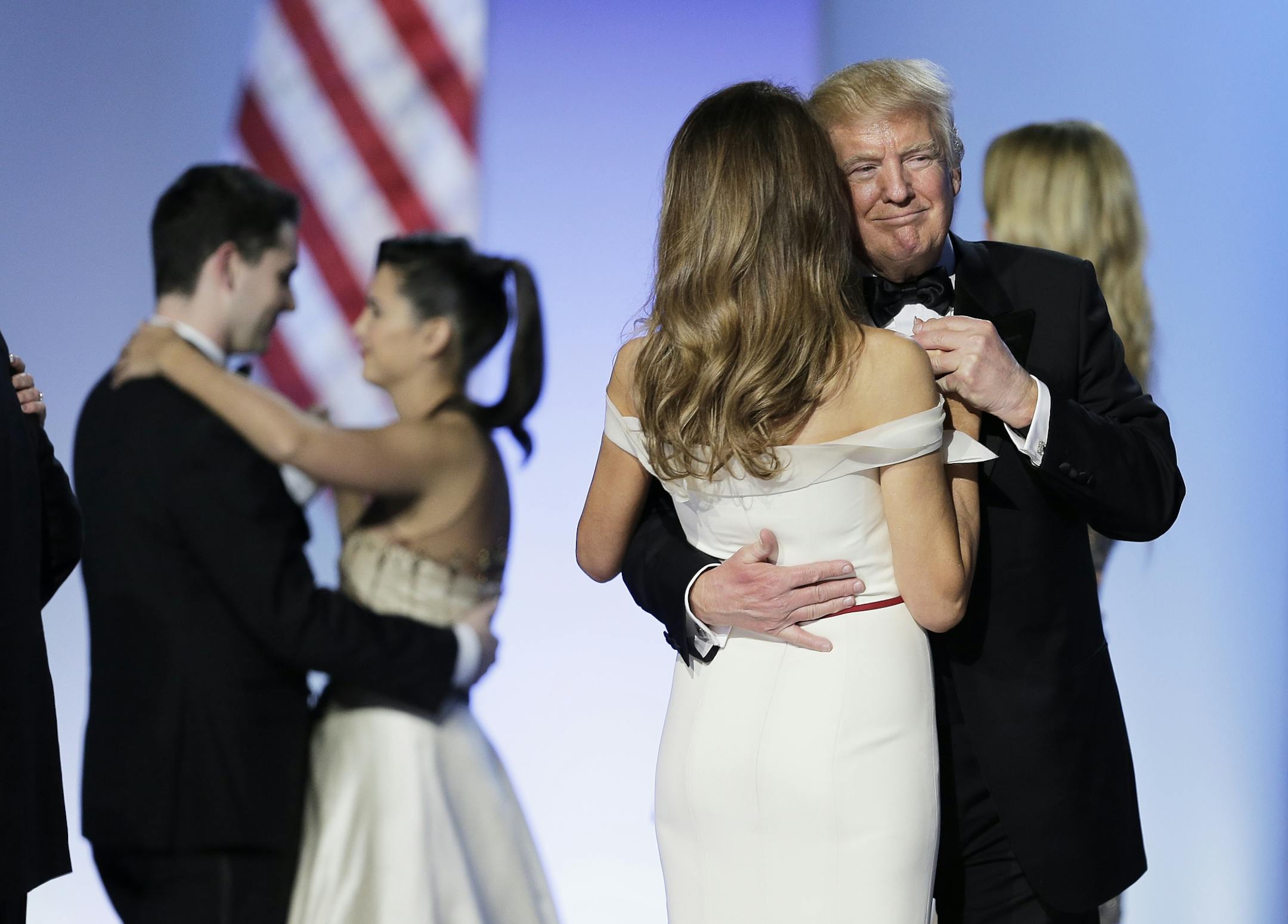 President Donald Trump and first lady Melania dance at the Freedom Ball in Washington, on Friday, Jan. 20, 2017, at the Washington Convention Center during the 58th presidential inauguration .