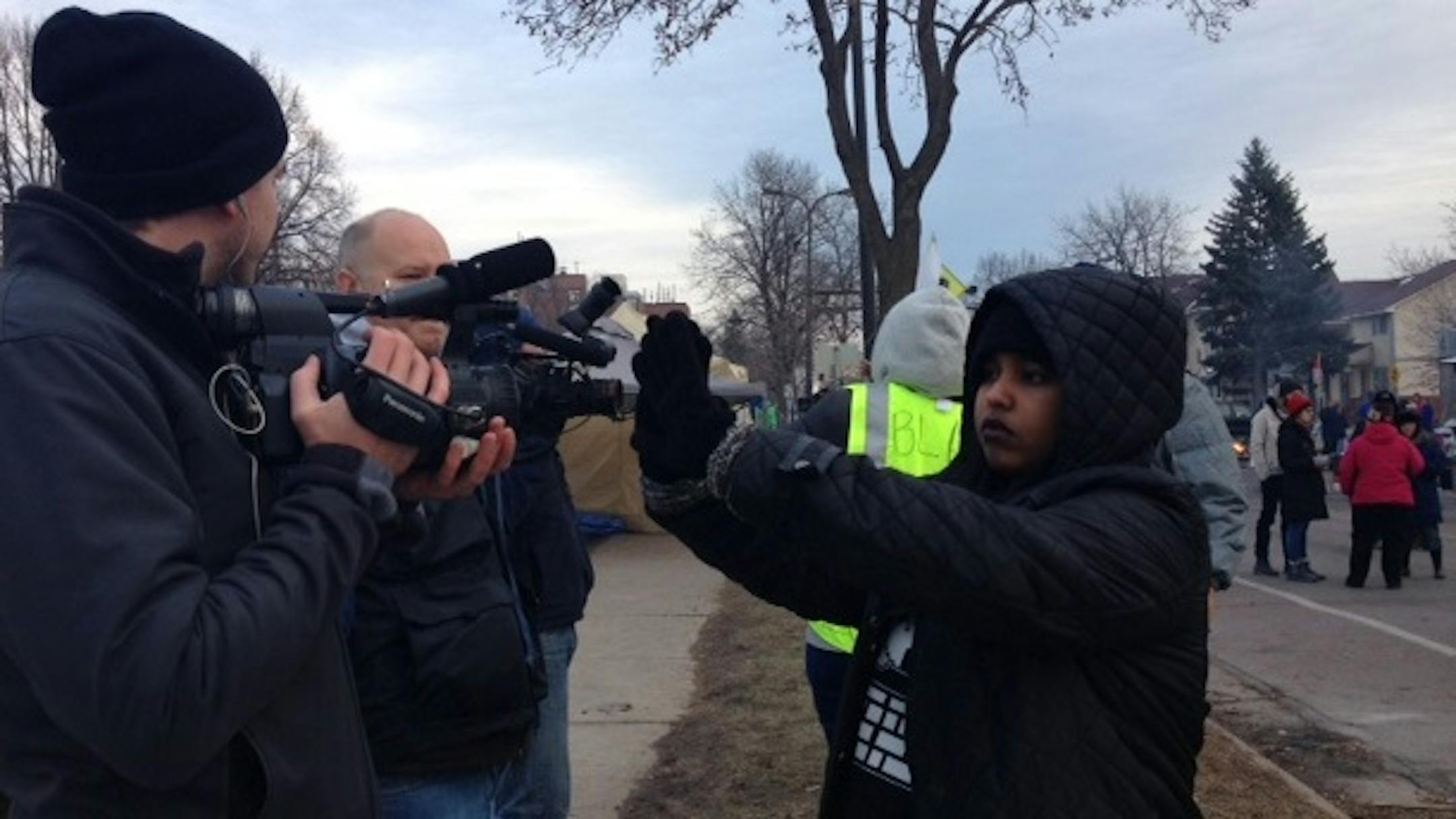 A Black Lives Matter activist blocked news media coverage Sunday of the Minneapolis fire chief visiting the encampment outside the police station on the North Side.