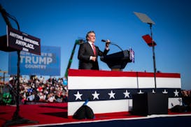 Doug Burgum, the Republican governor of North Dakota, speaks at a campaign rally for former President Donald Trump in Wildwood, N.J., on May 11.