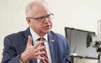 Gov. Tim Walz on Thursday signed a bill regulating school resource officer programs and allowing them, once again, to place students in the prone posi