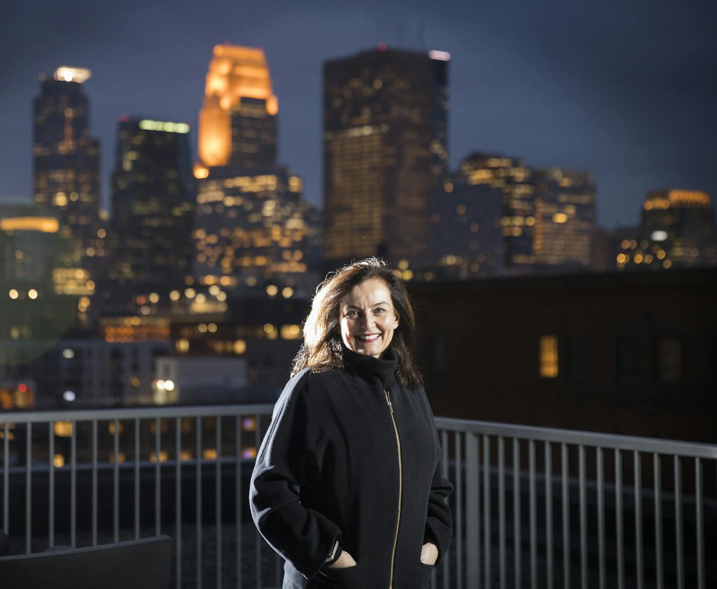 Condo owner Chrysanne Manoles poses on the roof of her condo building. ] LEILA NAVIDI &#xef; leila.navidi@startribune.com BACKGROUND INFORMATION: Condo owner Chrysanne Manoles poses for a photo at Tower Lofts in downtown Minneapolis on Thursday, November 2, 2017. Empty nesters are selling the big suburban houses where they raised their kids, choosing downtown condos where they can live like millennials.