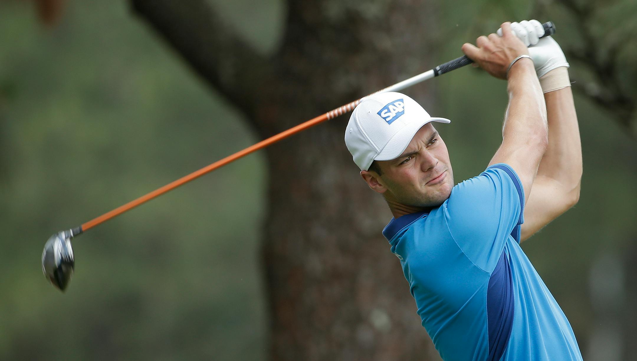 Martin Kaymer, of Germany, watches his tee shot on the second hole during the first round of the U.S. Open golf tournament in Pinehurst, N.C., Thursday, June 12, 2014. (AP Photo/Chuck Burton)