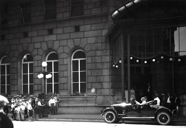 A production crew films a scene for the 1922 film “Free Air” outside of the Saint Paul Hotel.