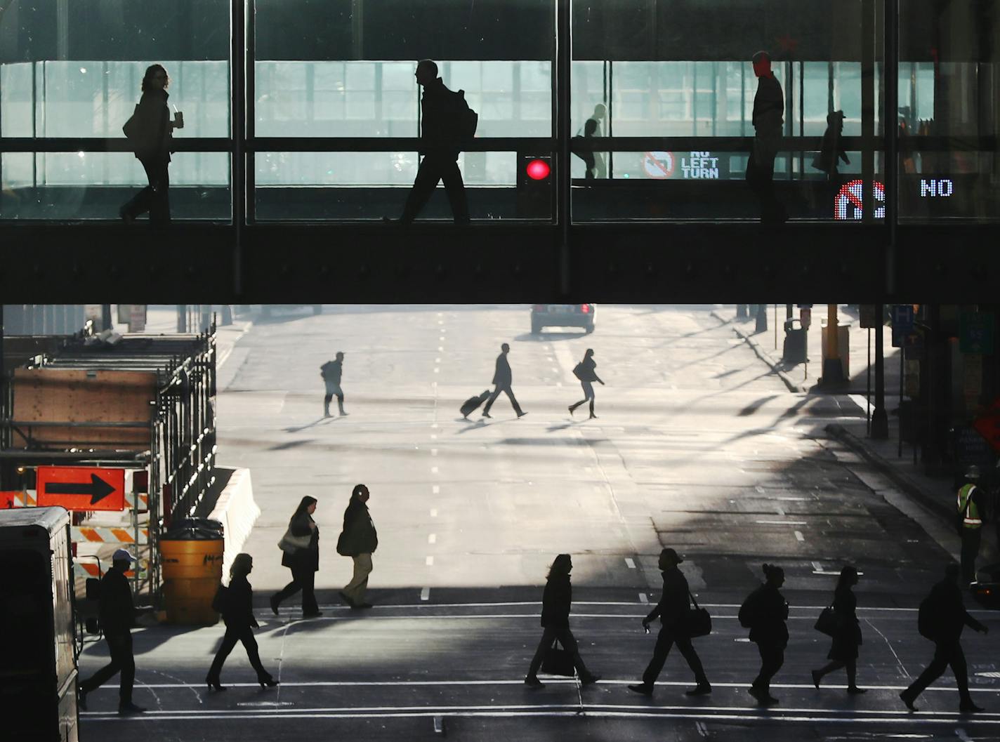 Entrepreneur Eric Dayton and skyway critic, along with three fellow skyway critics, launched their "Skyway Avoidance Society" to encourage people to walk on the sidewalk Wednesday, Nov. 16, 2016, along Nicollet Avenue near 8th St. S. in Minneapolis, MN. Here, as Dayton, not pictured, worked a nearby street corner, pedestrians come and go along the street and skyway.](DAVID JOLES/STARTRIBUNE)djoles@startribune.com One of the most vocal critics of Minneapolis skyways, entrepreneur Eric Dayton, is