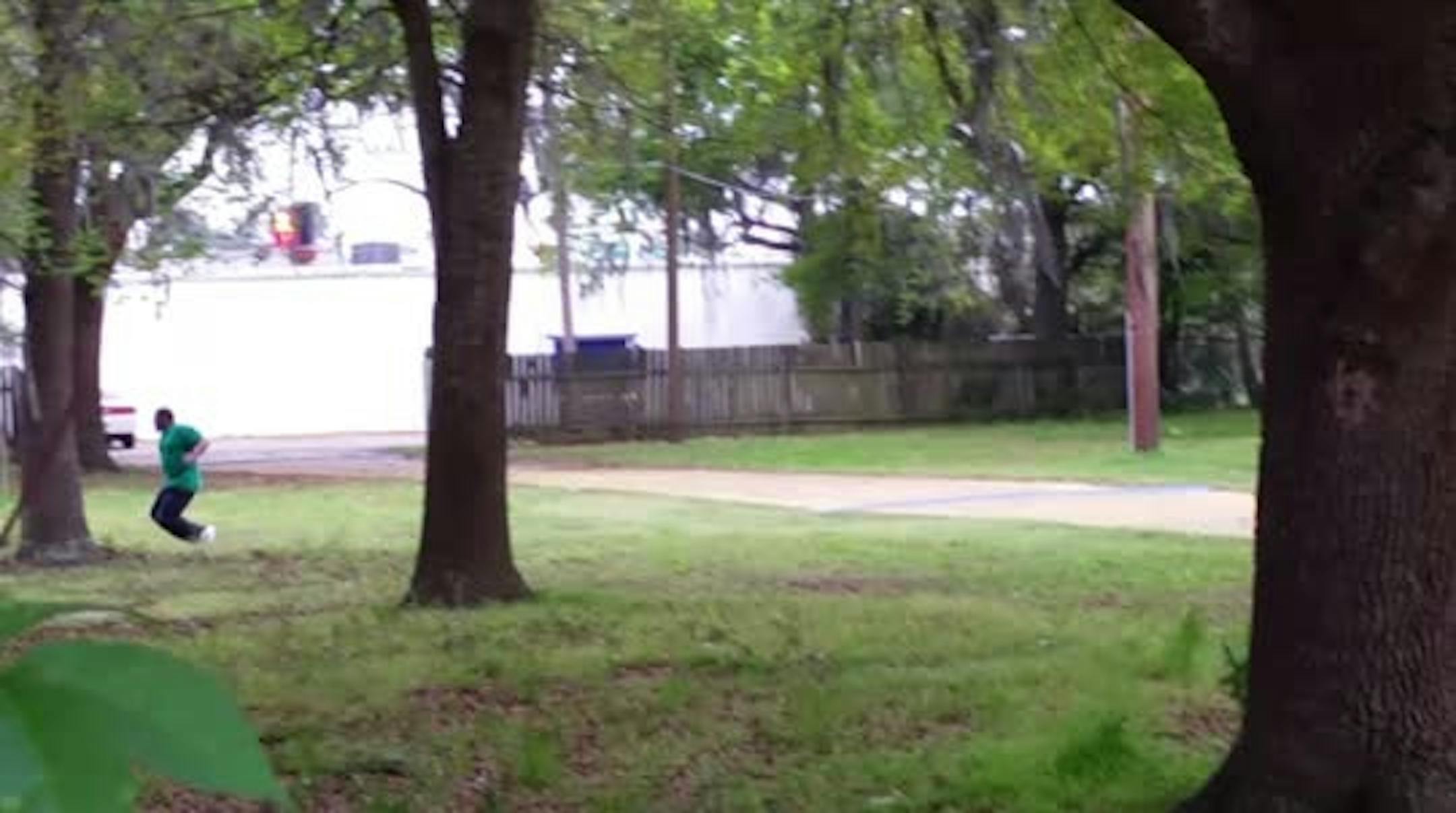 In this April 4, 2015, frame from video provided by Attorney L. Chris Stewart representing the family of Walter Lamer Scott, Scott appears to be running away from City Patrolman Michael Thomas Slager, right, in North Charleston, S.C.