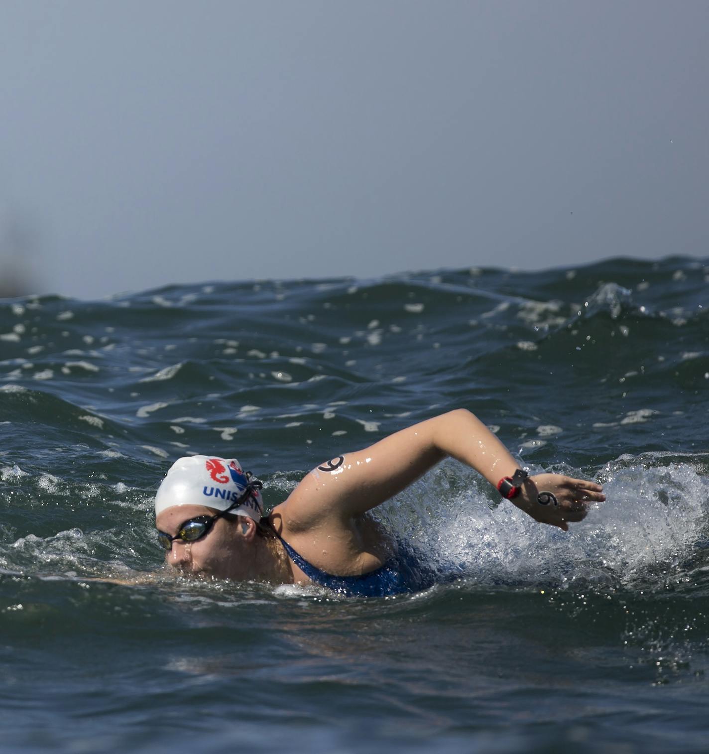 Brazil's Catarina Ganzelli competes in the women's marathon swimming test event ahead of the Rio 2016 Olympic Games near Copacabana Beach in Rio de Janeiro, Brazil, Sunday, Aug. 23, 2015. (AP Photo/Leo Correa) ORG XMIT: XLC106