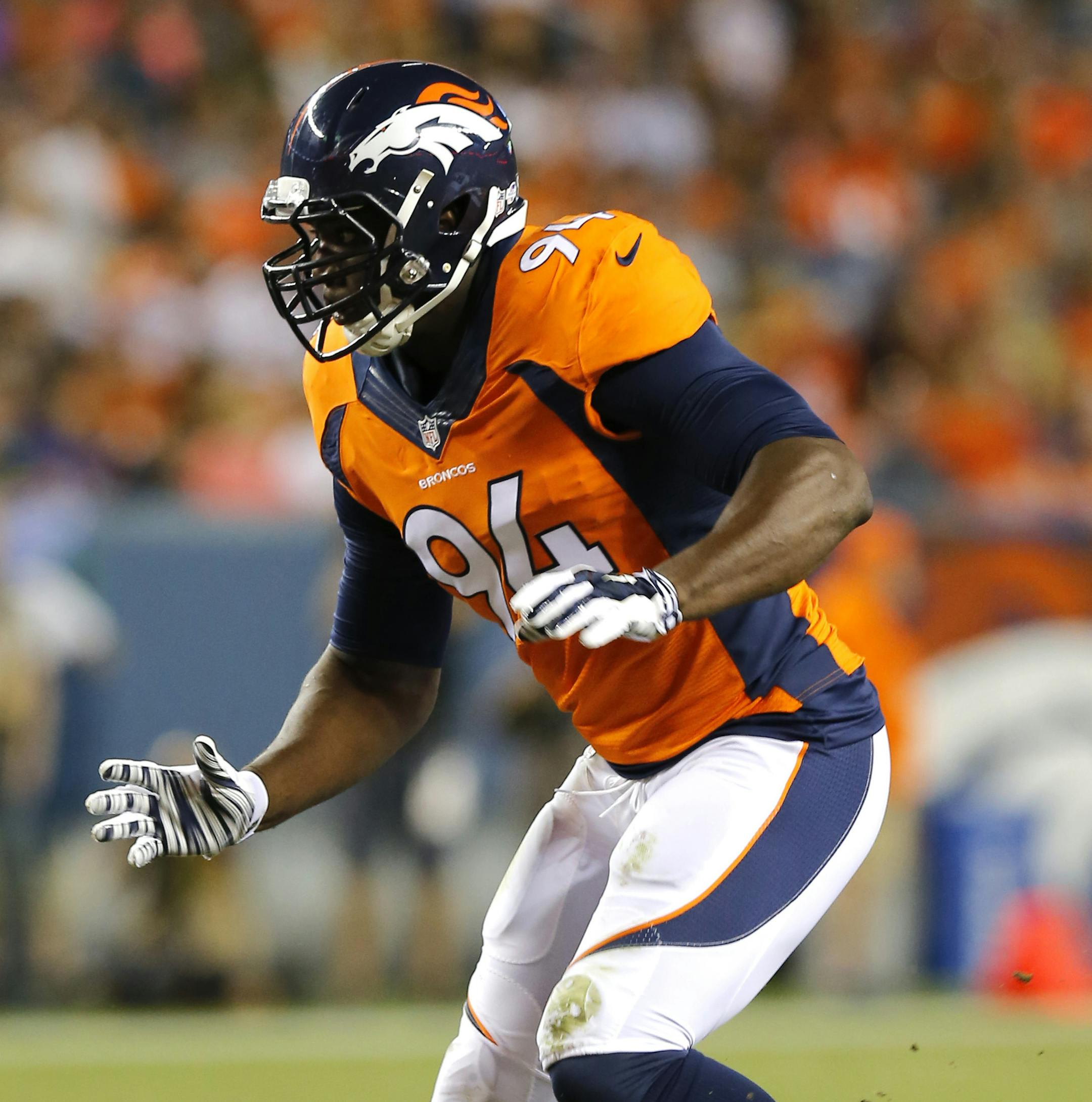 Denver Broncos defensive end DeMarcus Ware competes against the Seattle Seahawks during the first half of an NFL preseason football game, Thursday, Aug. 7, 2014, in Denver. (AP Photo/Jack Dempsey) ORG XMIT: NYOTK