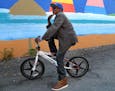 Abdi Rahim Abdi, 33, of Minneapolis showed off his Mongoose bike during an interview near Chicago Avenue on Sept. 13, 2017, in Minneapolis, MN. Abdi, 