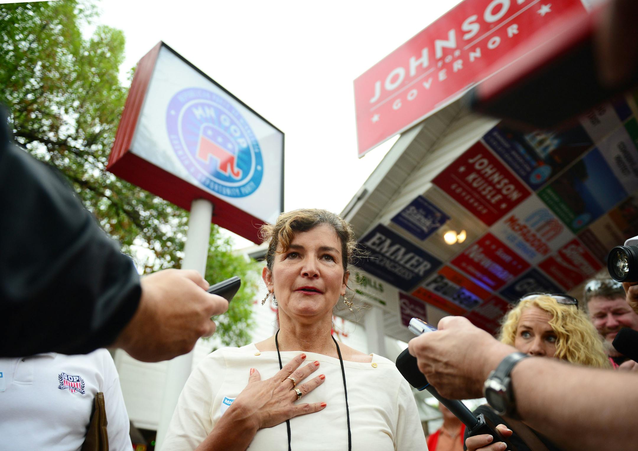 Endorsed GOP candidate MN Supreme Court Michelle McDonald defied Republican Party officials who did not want her in the Republican display at the Minnesota State Fair. plain clothes security people surrounded her and escorted her outside the booth. She resisted their attempts to remove her, video recording the whole exchange. She then spoke to the press outside, vowing to return. ] August 21, 2014 GLEN STUBBE * gstubbe@startribune.com