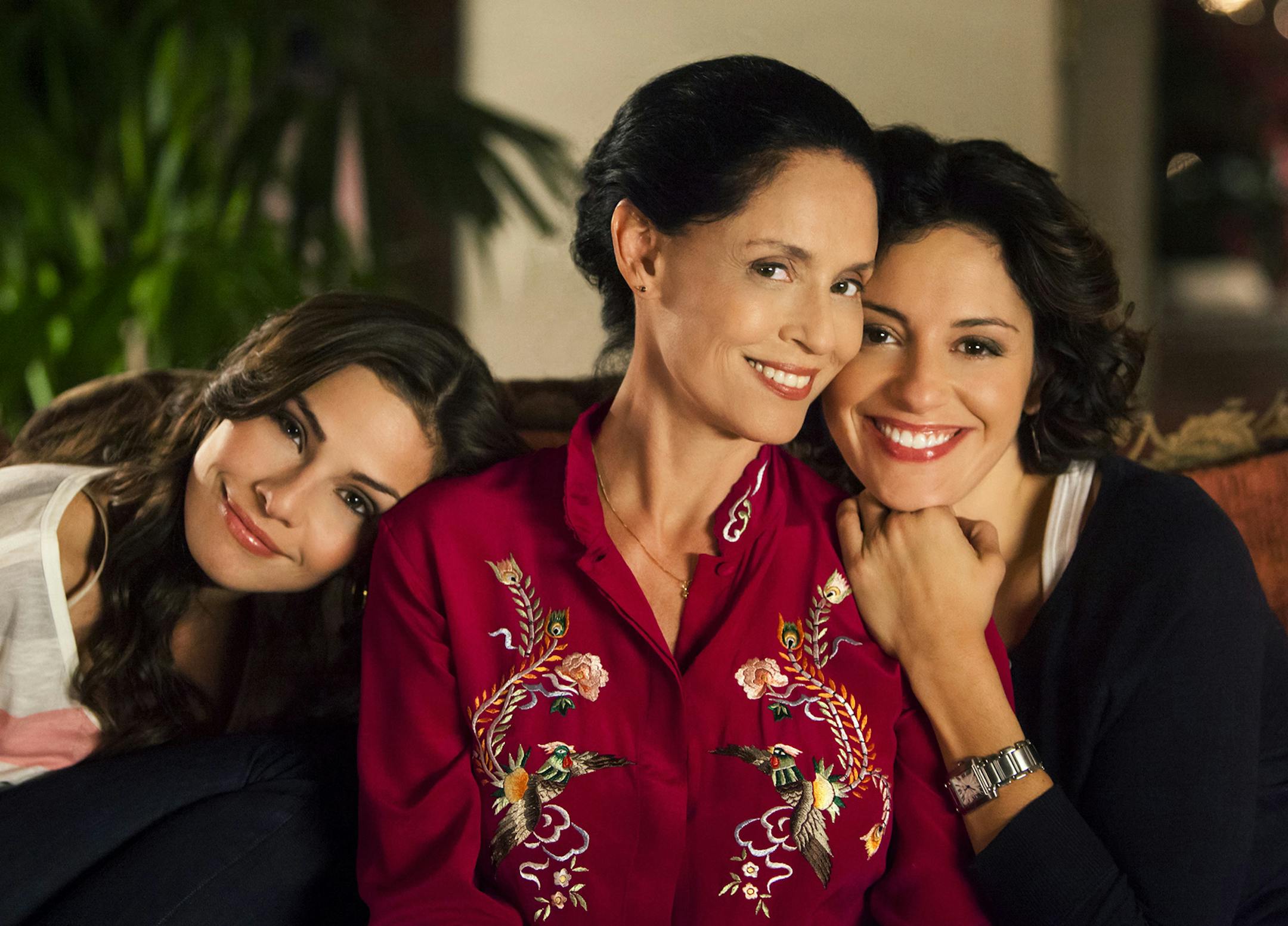 Crown Media Sonia Braga, center, plays an overbearing mother to Ana Ayora, left, and Mercedes Renard in ‚ÄúMeddling Mom."
