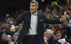 Virginia coach Tony Bennett gestures during an NCAA college basketball game against Notre Dame in Charlottesville, Va., Tuesday, Feb. 11, 2020. Virgin
