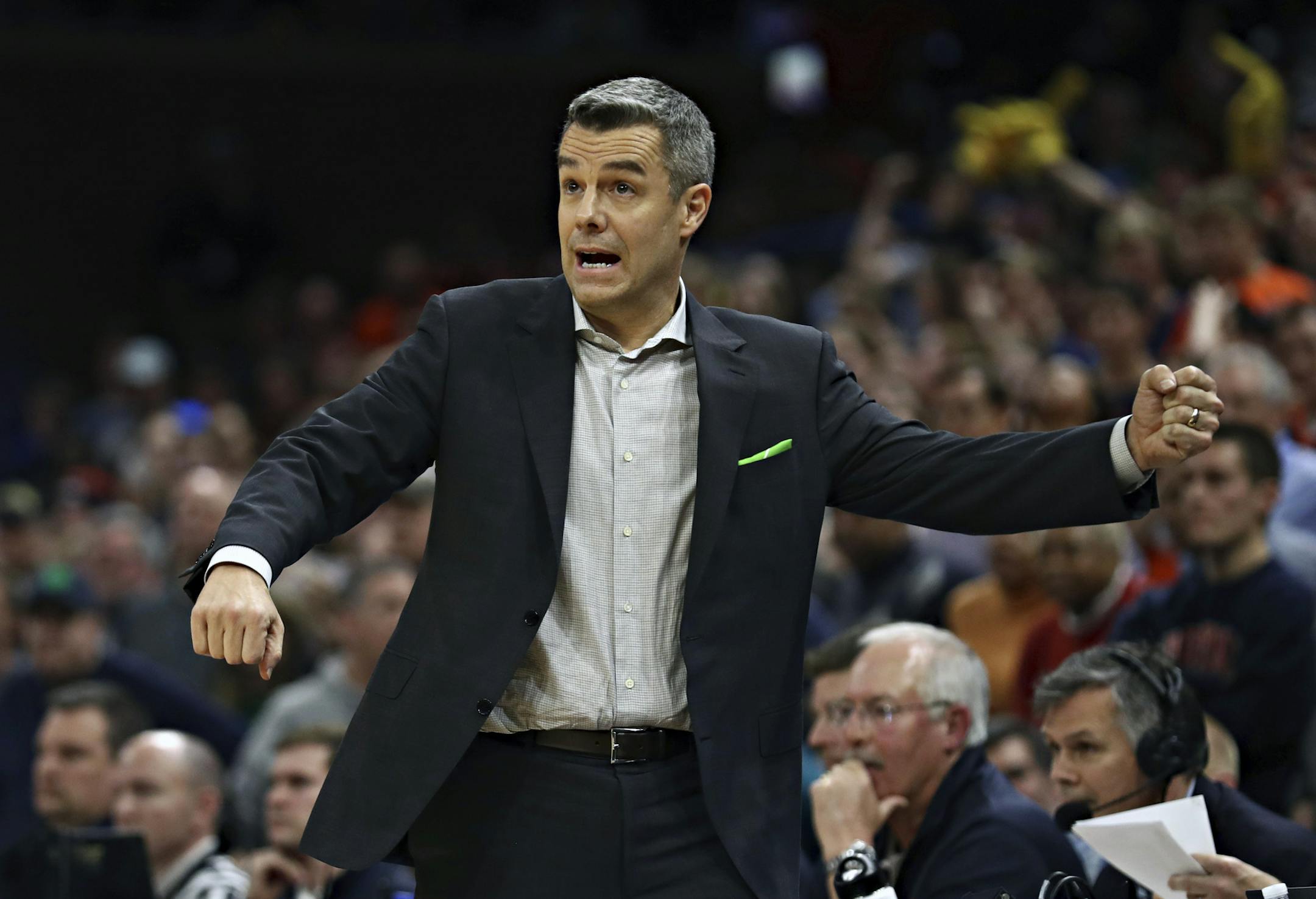 Virginia coach Tony Bennett gestures during an NCAA college basketball game against Notre Dame in Charlottesville, Va., Tuesday, Feb. 11, 2020. Virginia defeated Notre Dame 50-49. (Erin Edgerton/The Daily Progress via AP)